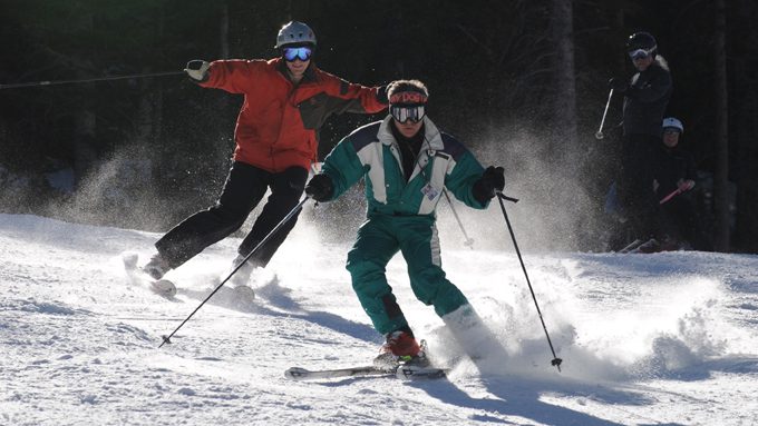 Skiers about to face plant